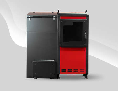 Solid fuel boiler on gray background. Energy savings conceptの写真素材