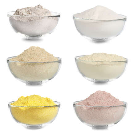 Different kinds of flour in bowls on white backgroundの写真素材