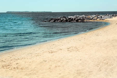 Oil spill on water near shore. Concept of ecological disasterの写真素材