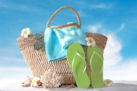 Beach accessories on sea shore. Summer vacation conceptの写真素材