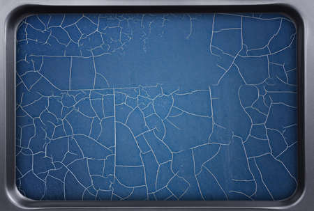 Cracked coating on metal backgroundの写真素材