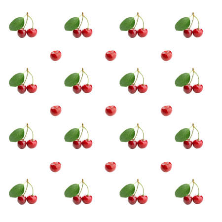 Collage of red cherries and green leaves on white backgroundの写真素材