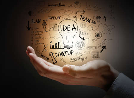 Man presenting business ideas on dark background, closeup. Concept of consultingの写真素材