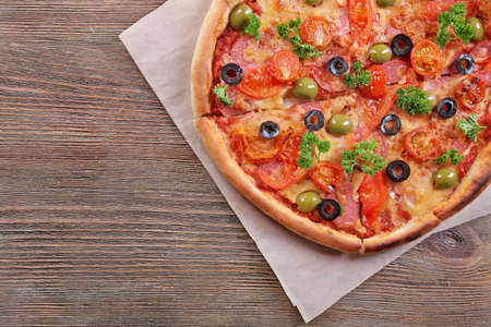 Tasty pizza with sausage and vegetablesの写真素材