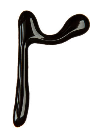 Small letter of alphabet made from chocolate syrup, isolated on  whiteの写真素材