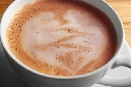 Cup of coffee latte art, closeupの写真素材