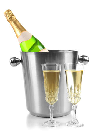 Bottle of champagne in bucket and glasses of champagne, isolated on whiteの写真素材