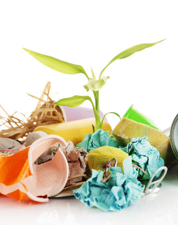 Pile of rubbish with plant isolated on whiteの写真素材