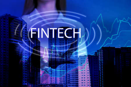 Fintech concept. Double exposure of cityscape and businesswoman, closeup Fintech concept. Double exposure of cityscape and businesswoman, closeup