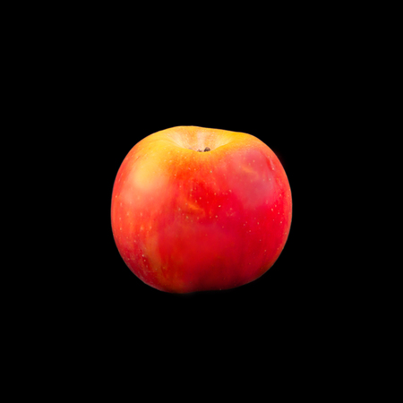 red apple isolated on black backgroundの写真素材