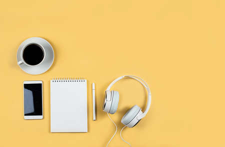 Flat layout on yellow background. Horizontal photo. Composition concept online conference, desktop, work from home and learning, concept blogging, online educationの写真素材