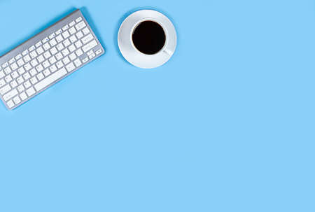 Flat layout on light blue background. Horizontal photo. Composition concept desktop with place for text, work from home and office, training, online education, space for text.の写真素材