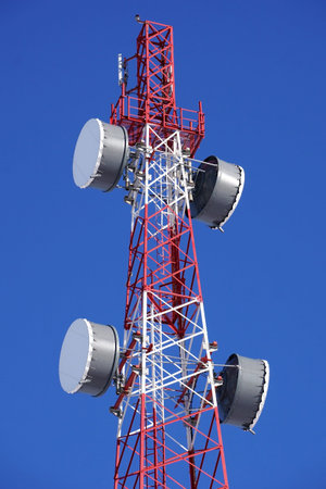 Cell tower on a background of blue sky