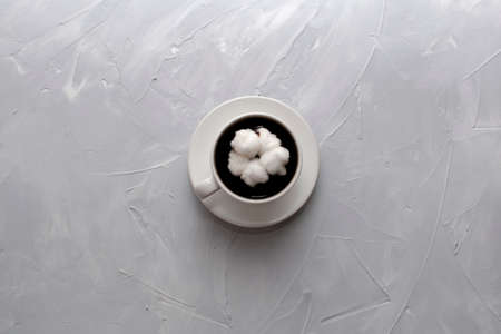 Top view of coffee cup on a concrete background with copy space.の写真素材