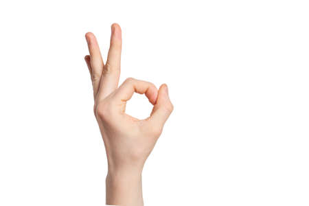 hand gesture OK on an isolated background. Outer side. Horizontal photo.の写真素材