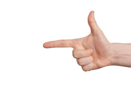 hand pistol gesture on isolated white background. Index finger shows direction. Horizontal photo.の写真素材