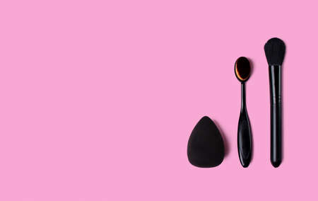 Cosmetics and accessories on a pink background. flat layの写真素材