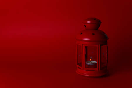 red christmas candlestick on a red background in the form of a street lamp. Copy Spaceの写真素材