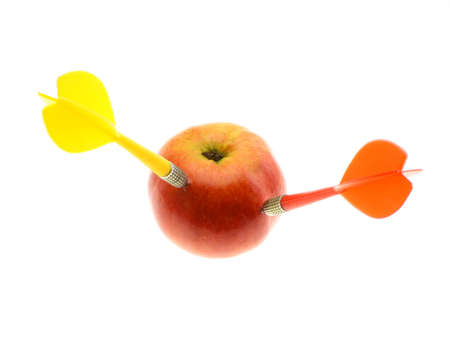 ripe apple and two dartの写真素材