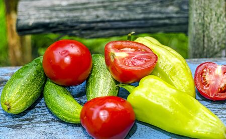Tomatoes cucumbers and peppers の写真素材