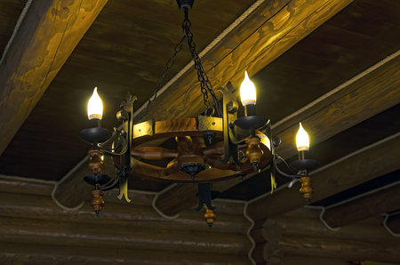 Light wooden wheel, barn chandelierの写真素材