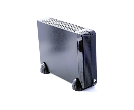 Small computer tower isolated on white backgroundの写真素材