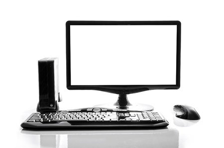 Desktop computer and keyboard and mouse on whiteの写真素材