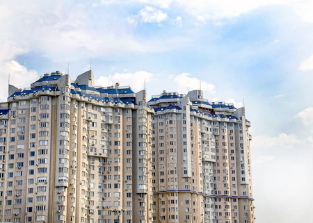 Multi-storey building construction on a background of blue sky