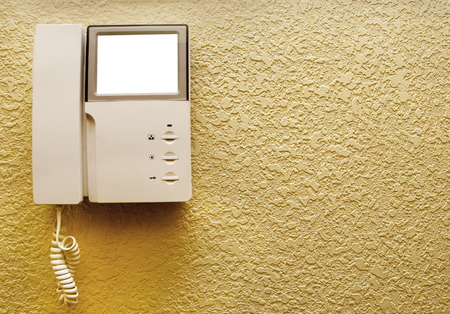 Security set with intercom over new stucco wallの写真素材