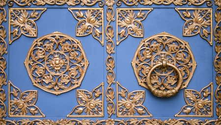 Details antique old  door with gold ornamentsの写真素材