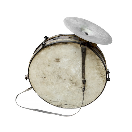 The old, worldly-wise, shabby, dusty bass drum for a wind band and a beaterの写真素材