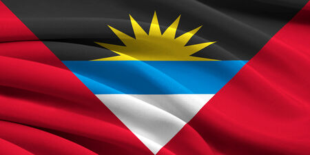 Flag of Antigua and Barbuda waving in the windの写真素材