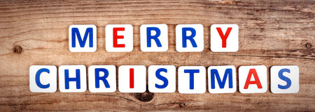 Merry christmas words on the wooden backgroundの写真素材