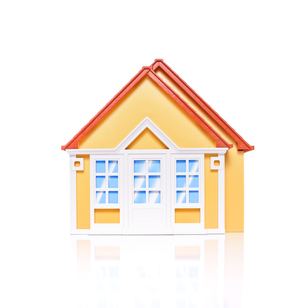 Studio image of modest 'first-time buyer' dwellings with white space and soft reflections. Copy space. Ideal for real estate or mortgage concepts.の写真素材