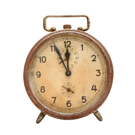 Old, retro alarm clock isolated on white.