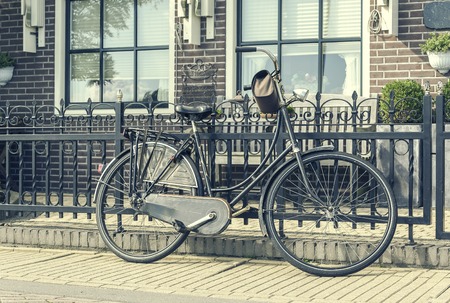 Retro style bicycle. Country village in the Netherlands.の写真素材