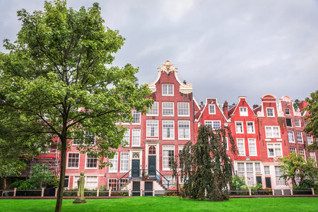 Odd Classic Brick Houses in Amsterdam, Holland.の写真素材