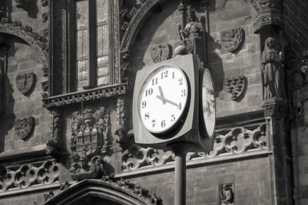 Street clock on a background of the Gothic architecture.の写真素材