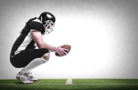 American football player on the football pitch.の写真素材