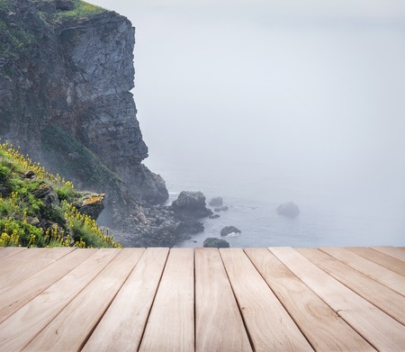 Empty wooden platform and Cape Kaliakra, Bulgaria. Rocky coast of Cape with sea views.の写真素材
