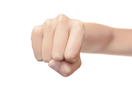 Woman fist isolated on a white background. Front view.の写真素材