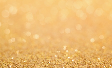 Glitter background. Christmas background. Shiny golden abstract backgroundの写真素材