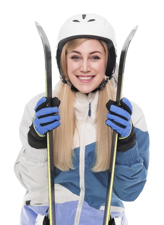 Attractive girl skier on white background.の写真素材