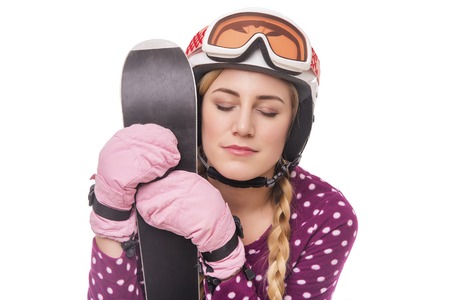 Attractive girl skier on white background.の写真素材