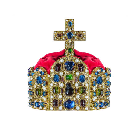 Gold crown with jewels isolated on white.