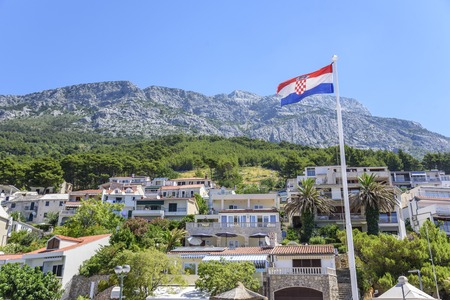 View of the houses is an apartment spread out on a mountain in the resort town of Brela, Croatiaのeditorial素材