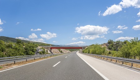 Bridge over a highway.の写真素材