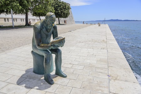 Statue of Spiridon Brusina on the waterfront of Zadar in Croatia.のeditorial素材