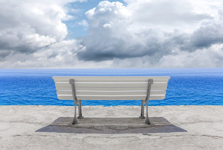 White bench on the waterfront.