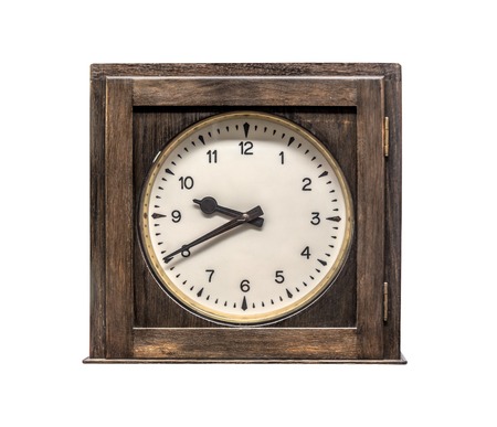 Old wooden clock isolated on white background.の写真素材